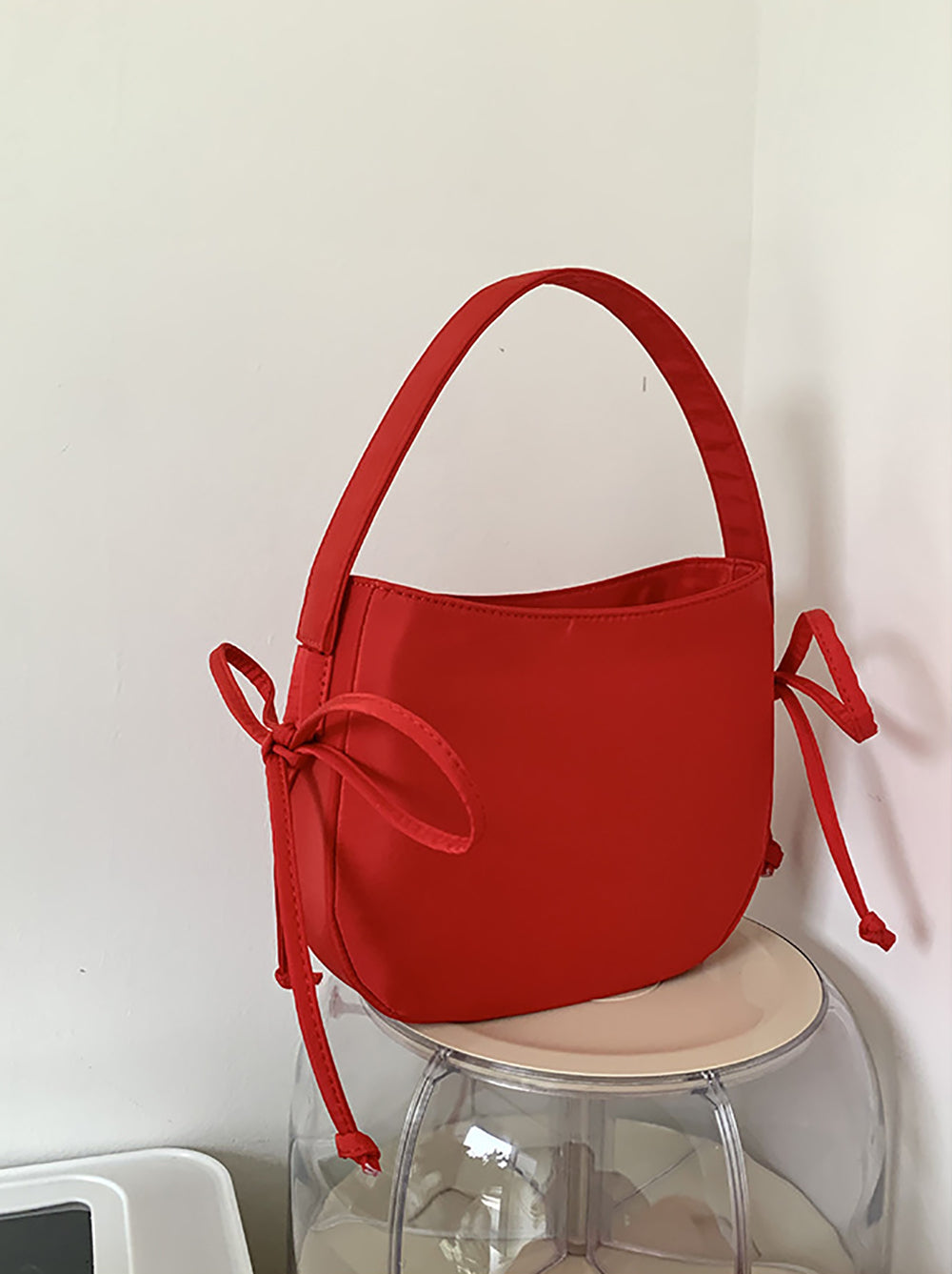 Women Solid Structured Handheld Bag