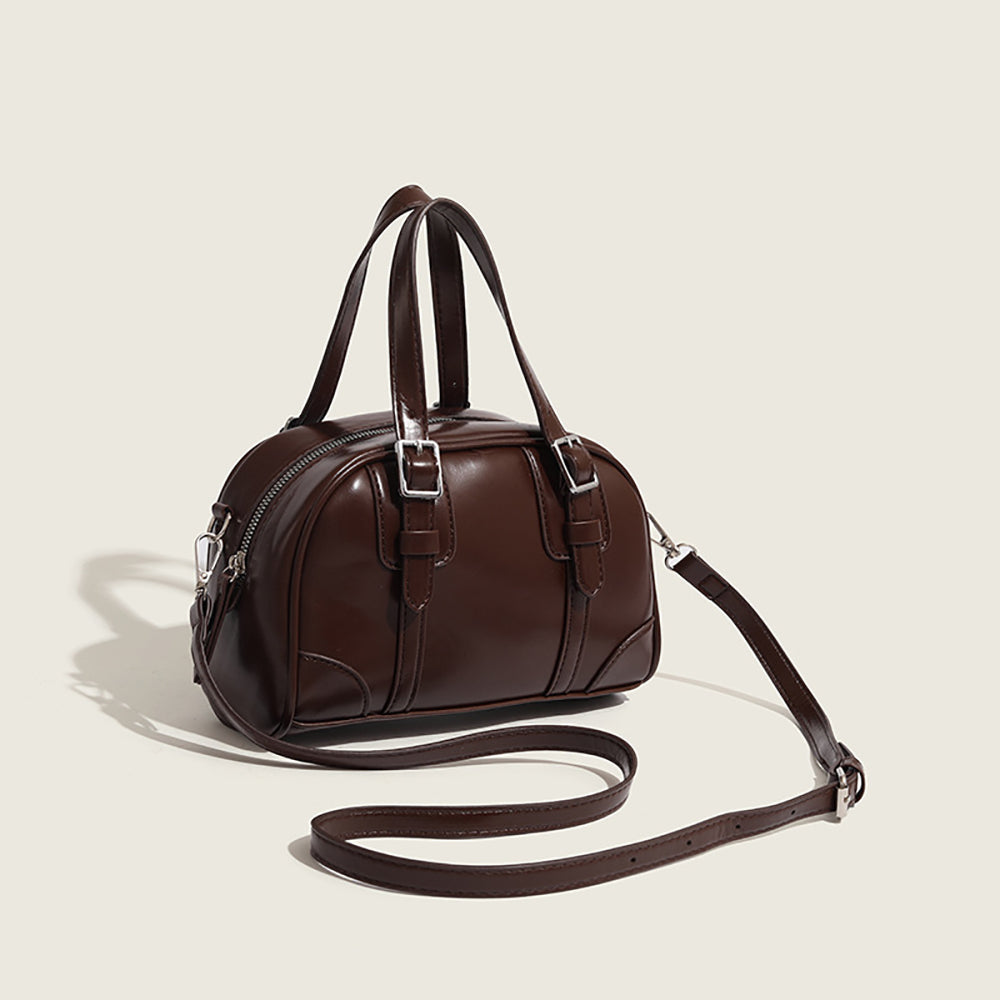 Women Solid Structured Handheld Bag