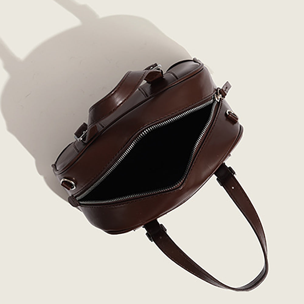 Women Solid Structured Handheld Bag