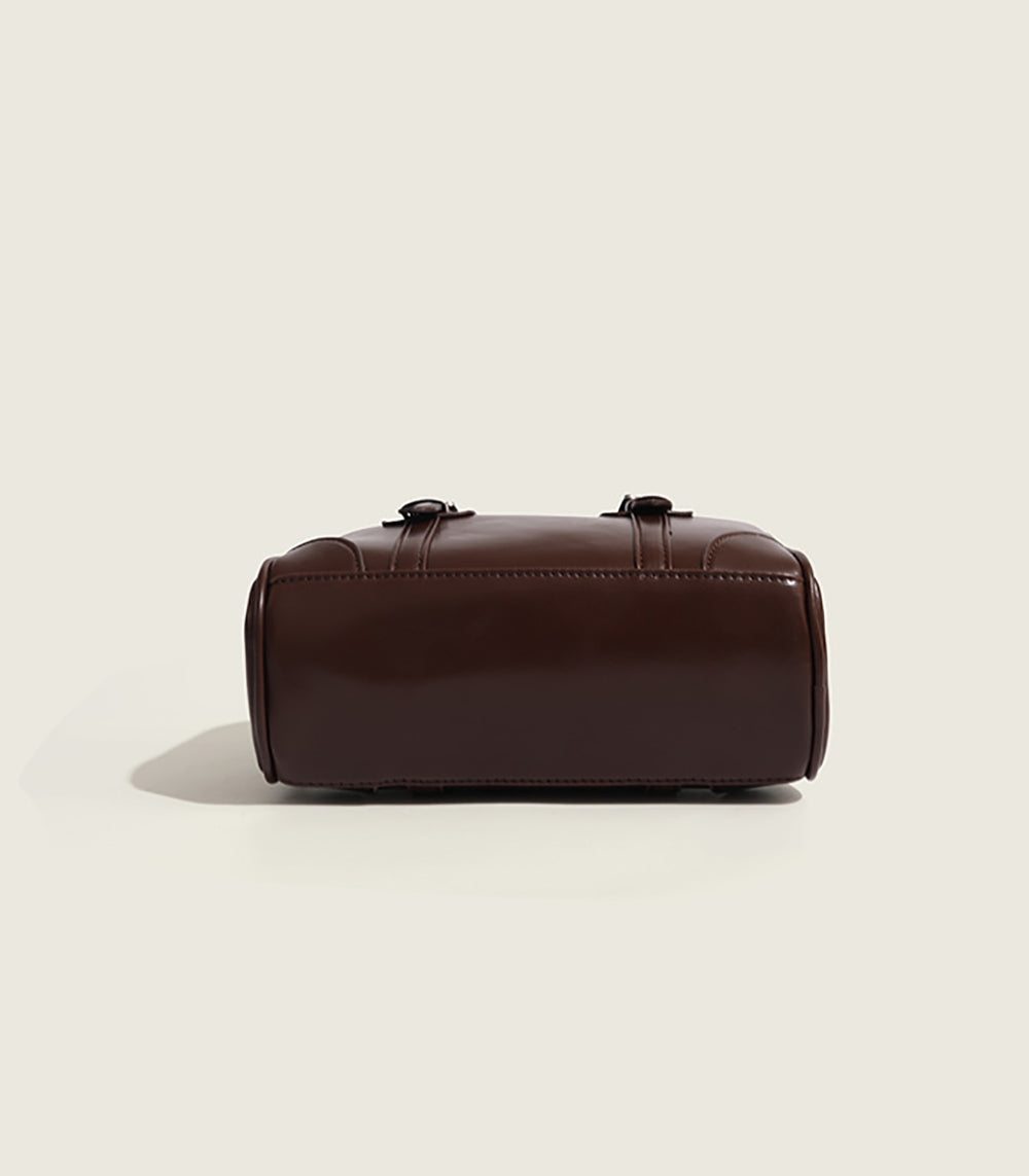 Women Solid Structured Handheld Bag