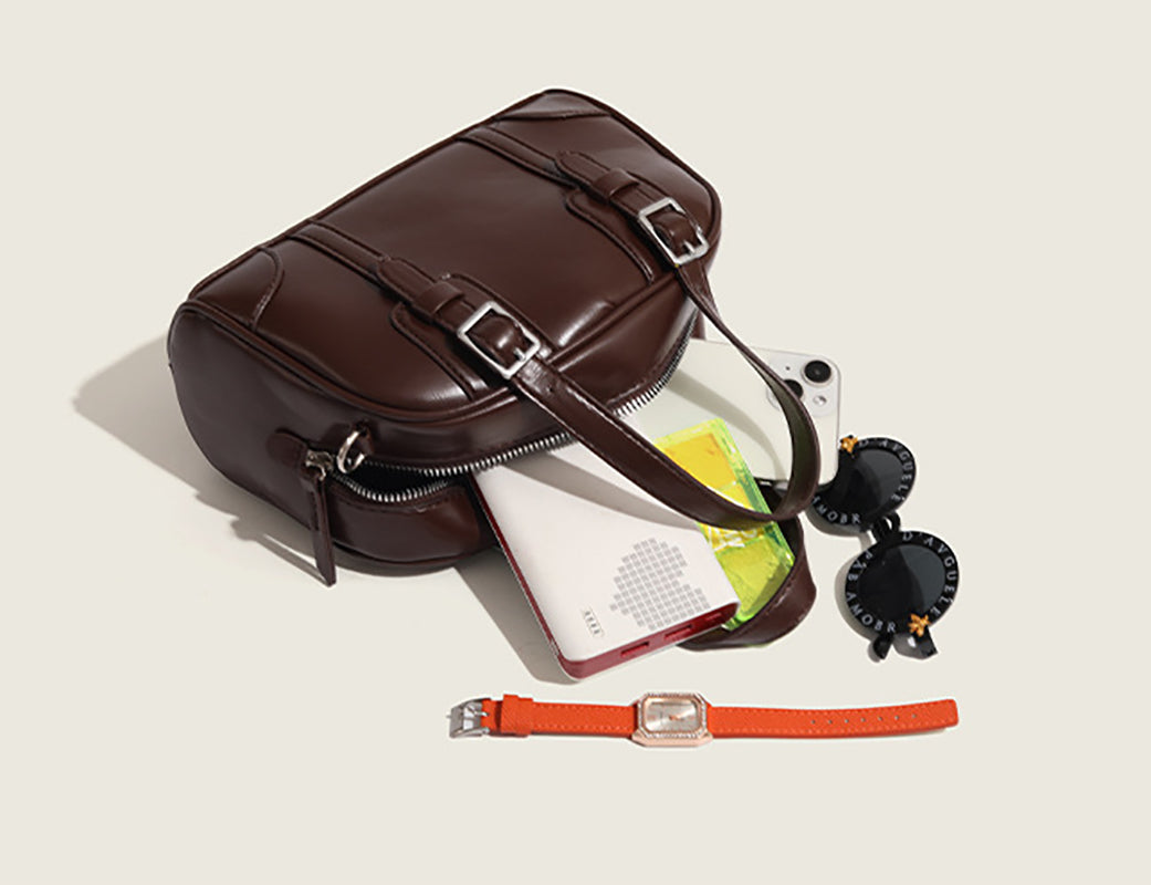 Women Solid Structured Handheld Bag