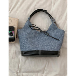 Women Solid Structured Handheld Bag