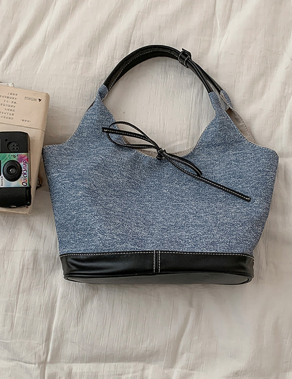 Women Solid Structured Handheld Bag