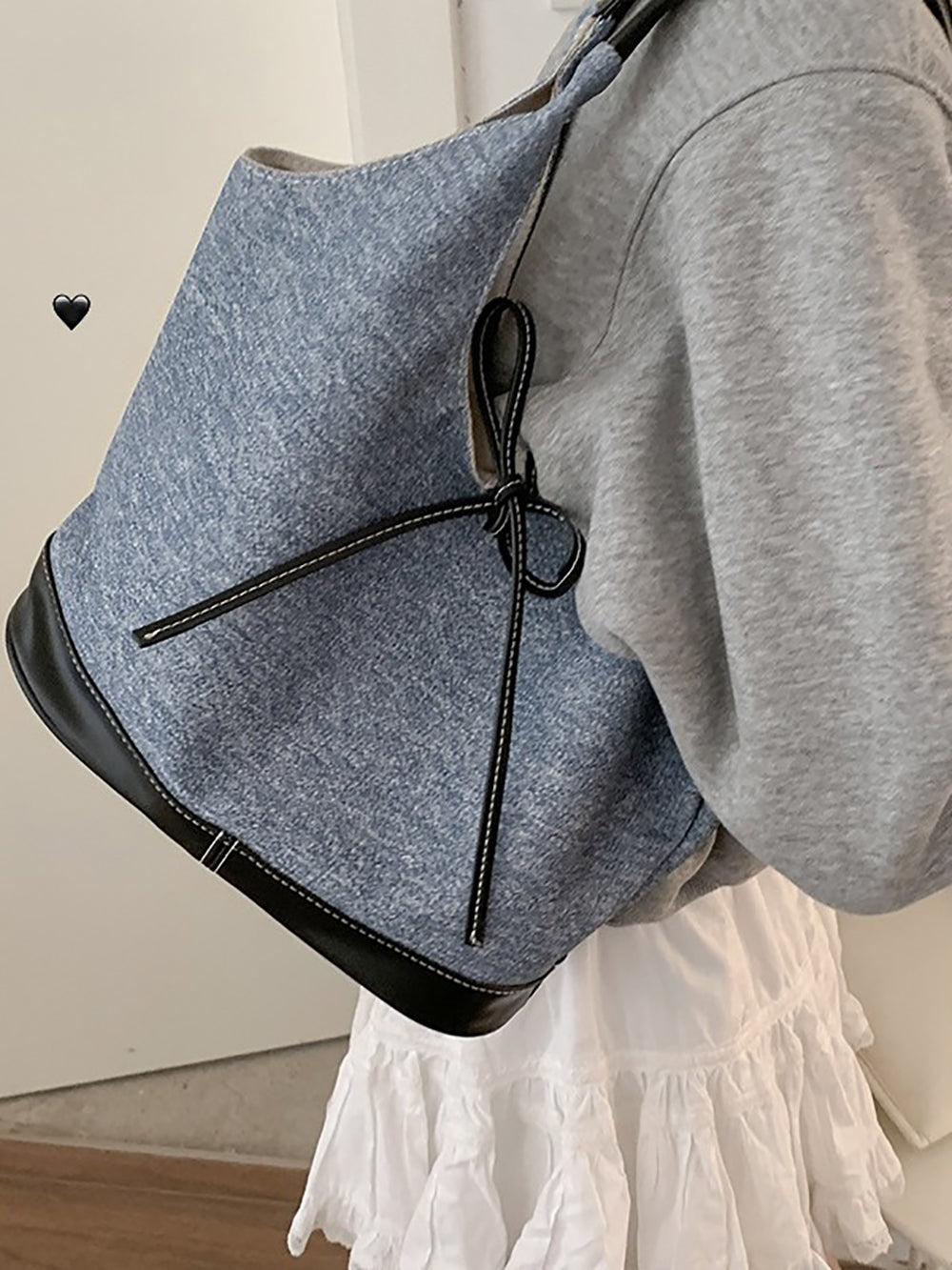 Women Solid Structured Handheld Bag