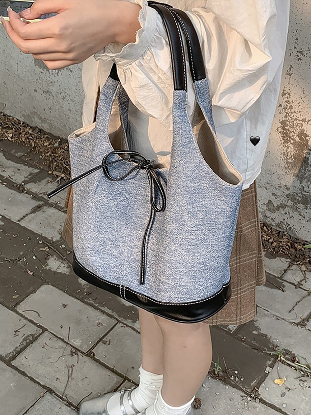 Women Solid Structured Handheld Bag