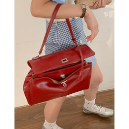 Women Solid Structured Handheld Bag