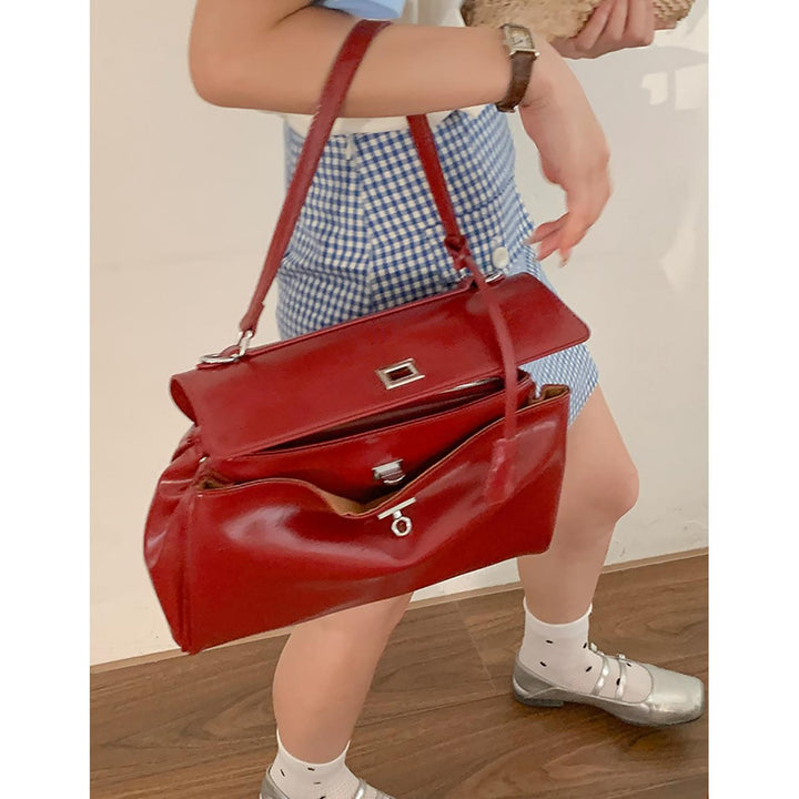 Women Solid Structured Handheld Bag