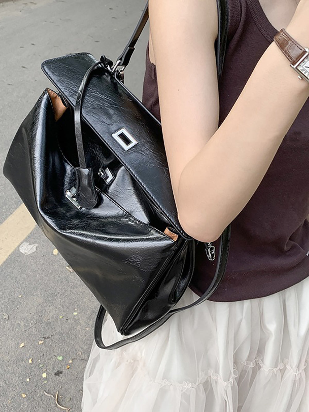 Women Solid Structured Handheld Bag