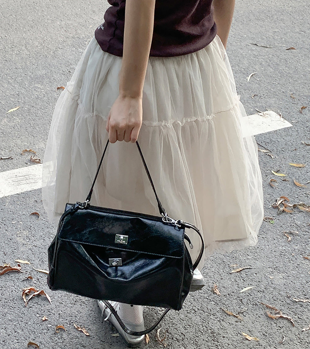 Women Solid Structured Handheld Bag
