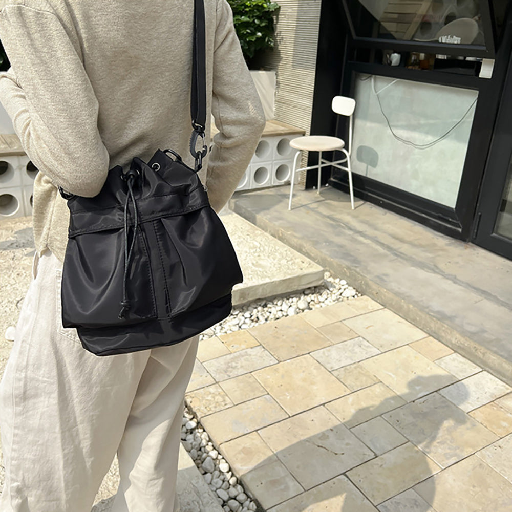 Women Solid Structured Handheld Bag