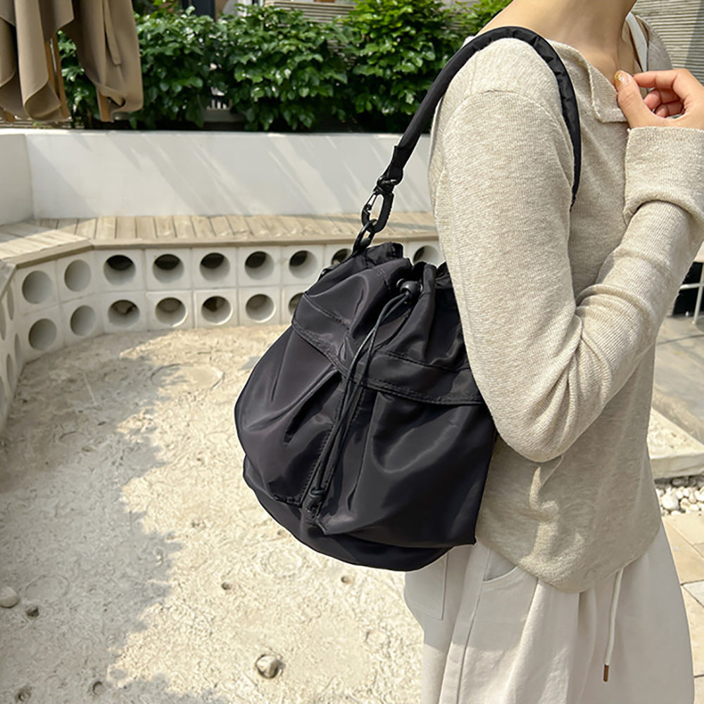 Women Solid Structured Handheld Bag