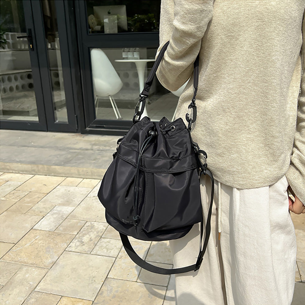 Women Solid Structured Handheld Bag