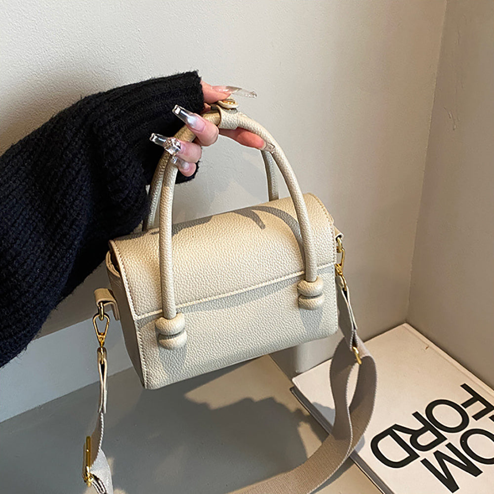Women Solid Structured Handheld Bag