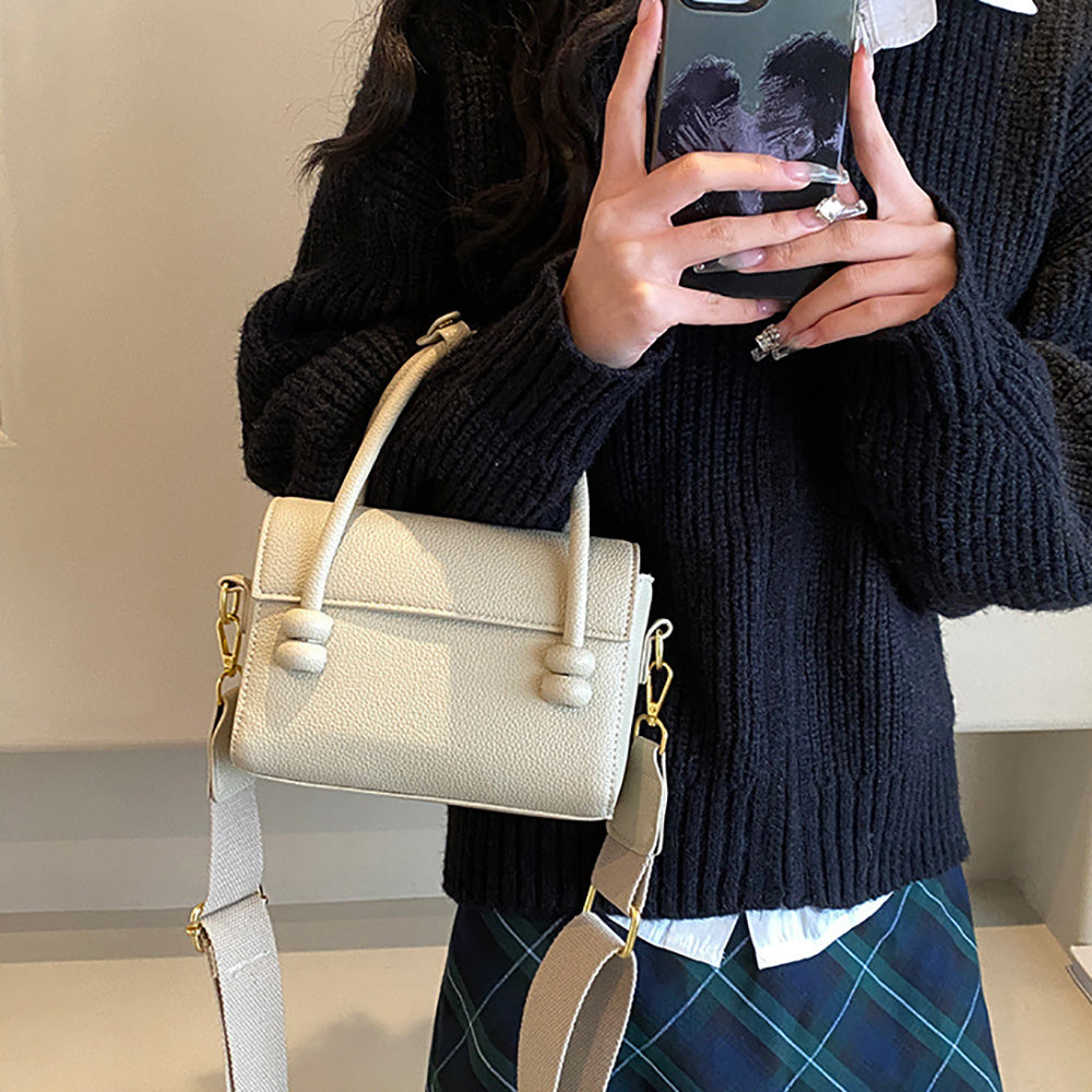 Women Solid Structured Handheld Bag