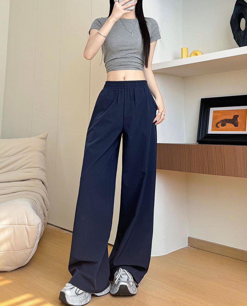 Women Solid Baggy Mid-Rise Casual Parachute Trouser
