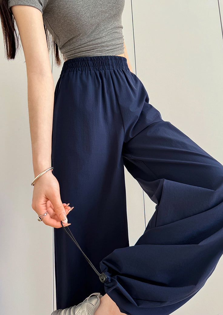 Women Solid Baggy Mid-Rise Casual Parachute Trouser