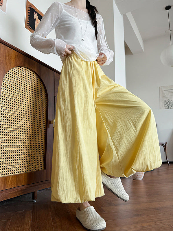 Women Solid Loose Fit Mid-Rise Pleated Culottes Trousers