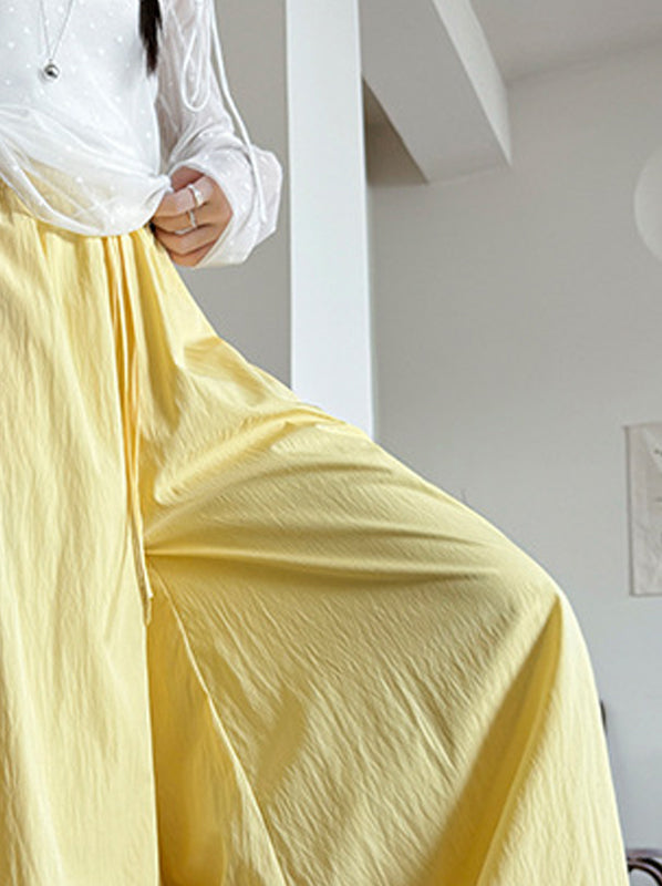 Women Solid Loose Fit Mid-Rise Pleated Culottes Trousers
