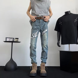 Men Skinny Fit Mid-Rise Light Fade Printed Jeans