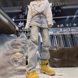 Women Regular Fit Mid-Rise Low Distress Light Fade Jeans