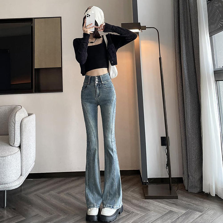 Women Flared Slash Knee Heavy Fade Jeans