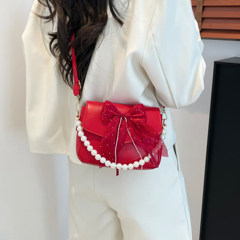 PU Bow Detail Structured Sling Bag