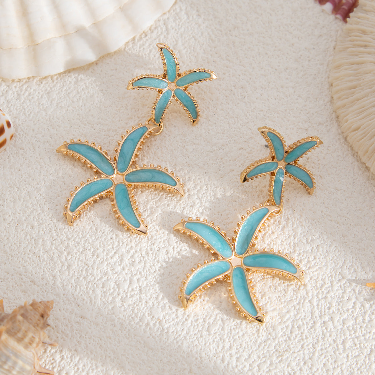 Gold Plated Star Shaped Drop Earrings