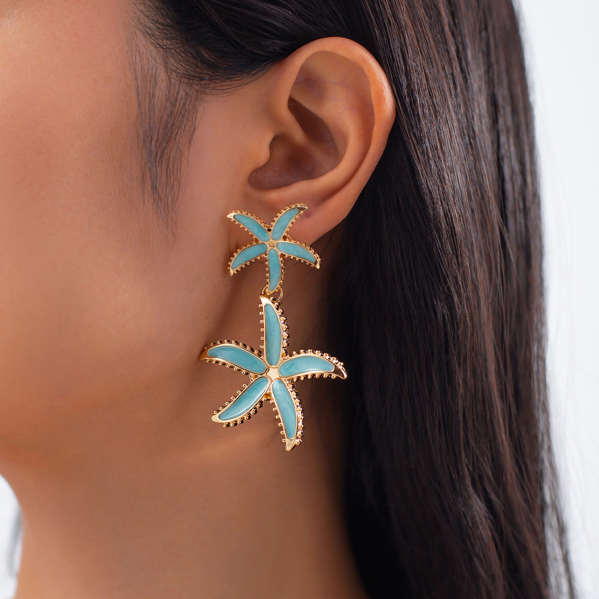 Gold Plated Star Shaped Drop Earrings