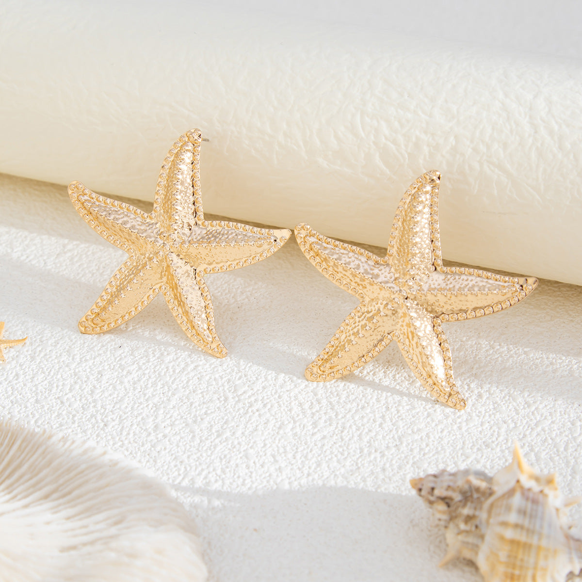 Gold-Plated Star Shaped Drop Earrings