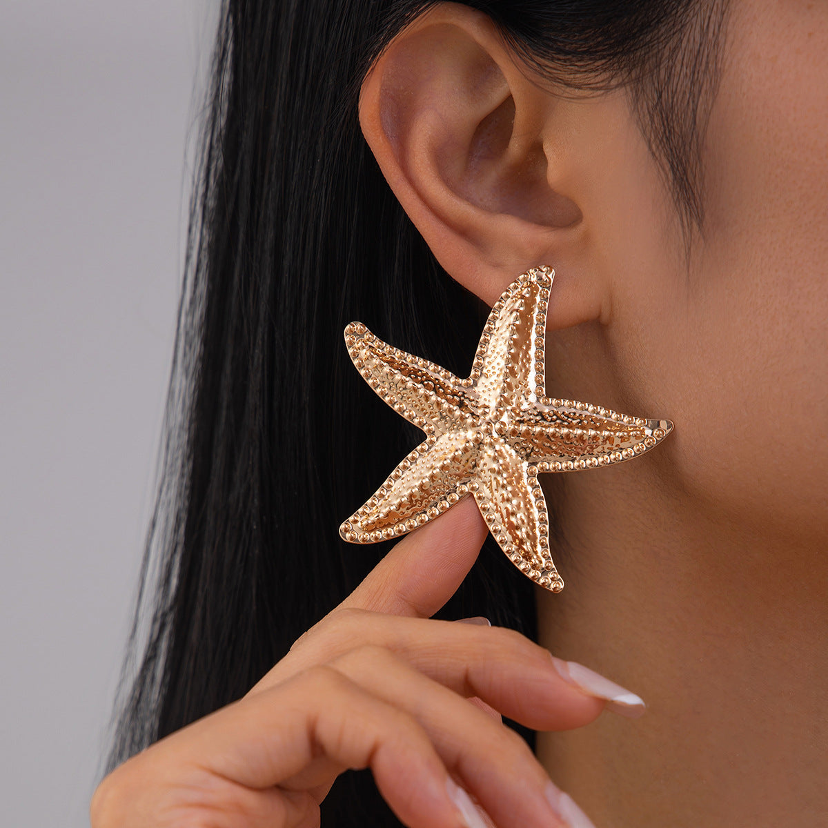 Gold-Plated Star Shaped Drop Earrings