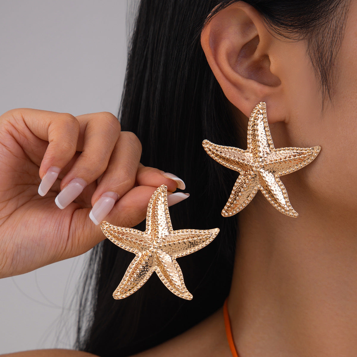 Gold-Plated Star Shaped Drop Earrings