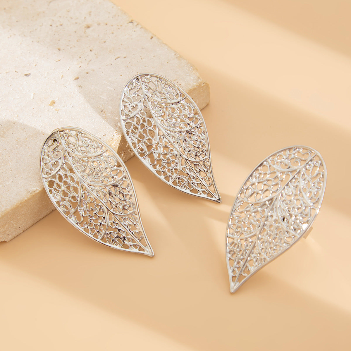 Silver-Plated Leaf Shaped Studs With Finger Ring